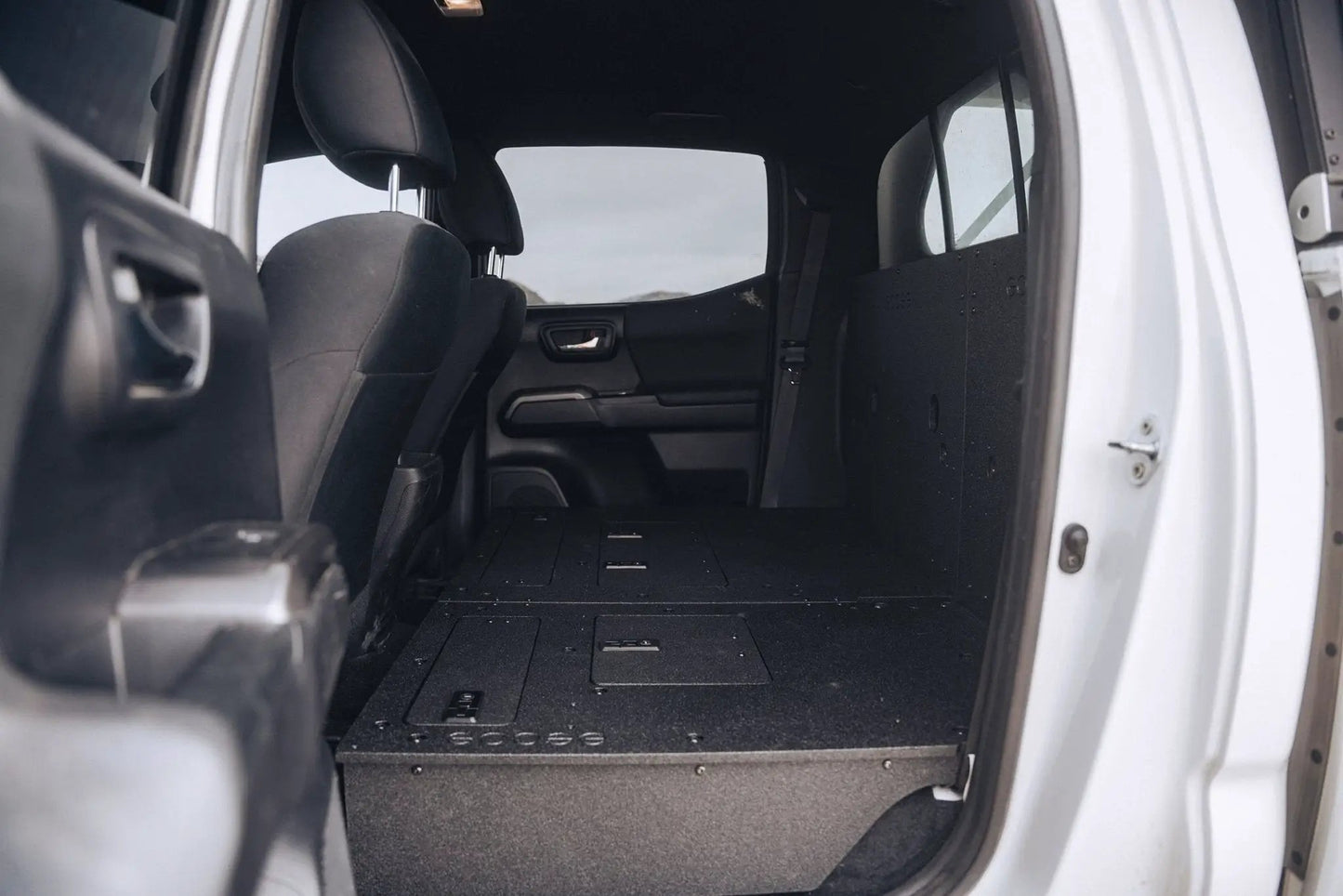 Toyota Tacoma 2005-2023 2nd and 3rd Gen Double Cab Version 2 - Second Row Seat Delete Plate System by Goose Gear
