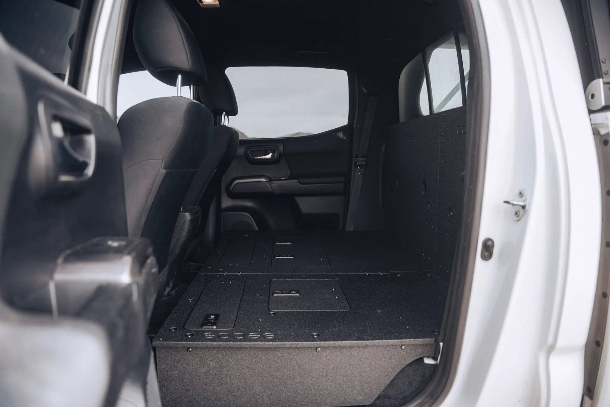 Toyota Tacoma 2005-2023 2nd and 3rd Gen Double Cab Version 2 - Second Row Seat Delete Plate System by Goose Gear