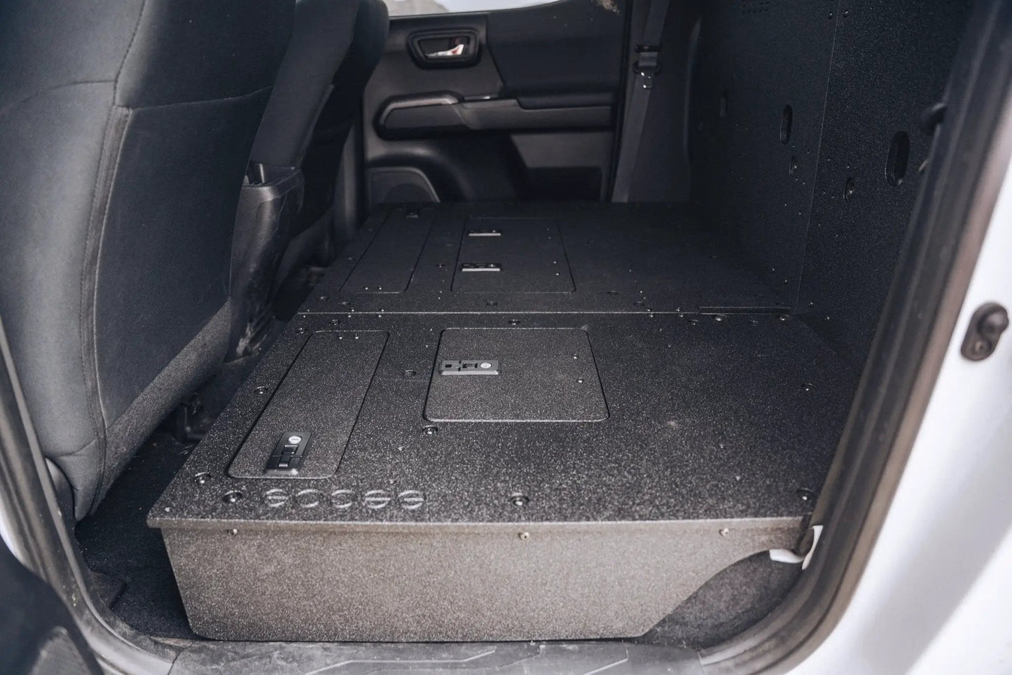 Toyota Tacoma 2005-2023 2nd and 3rd Gen Double Cab Version 2 - Second Row Seat Delete Plate System by Goose Gear