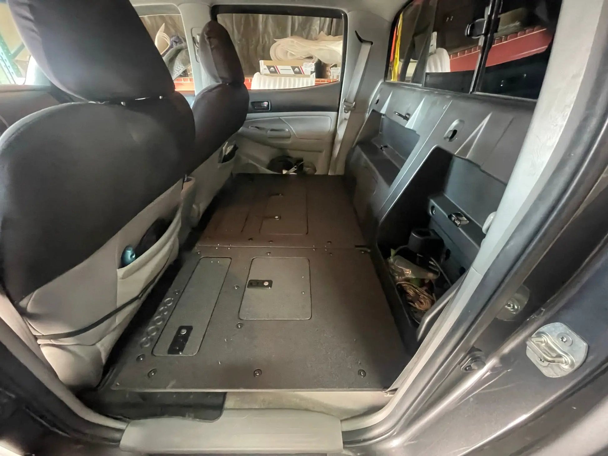 Toyota Tacoma 2005-2023 2nd and 3rd Gen. Double Cab - Second Row Seat Delete Plate System keeping Factory Back Wall by Goose Gear