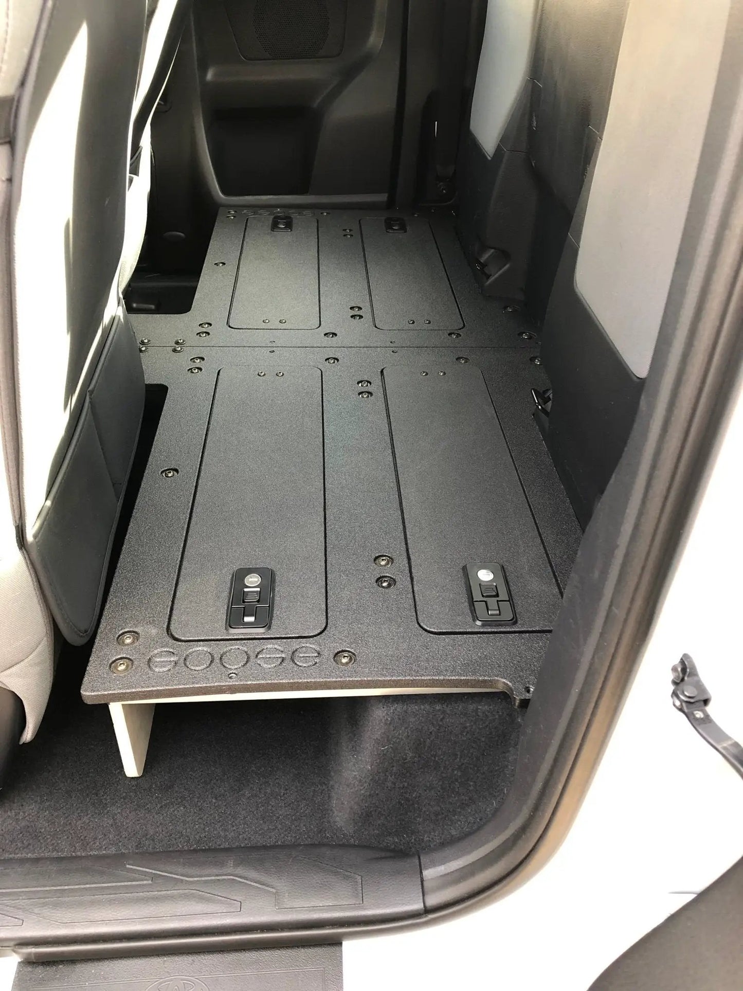 Toyota Tacoma 2016-2023 3rd Gen. Access Cab with Factory Seats - Second Row Seat Delete Plate System by Goose Gear